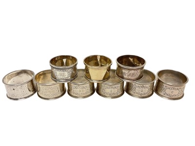 Lot 435 - Group of nine silver napkin rings