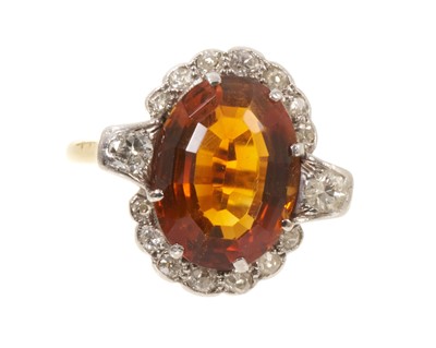 Lot 674 - Citrine and diamond cocktail ring