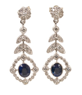 Lot 627 - Pair of Edwardian style sapphire and diamond pendant earrings in 18ct white gold setting