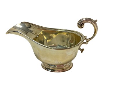 Lot 437 - Silver sauce boat