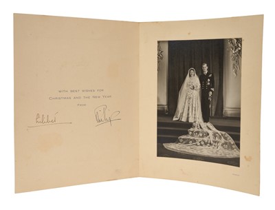 Lot 92 - T.R.H. The Princess Elizabeth (later H.M. Queen Elizabeth II) and The Duke of Edinburgh, scarce family signed 1947 Christmas card with gilt crown to cover, 1947 wedding photograph to the interio...