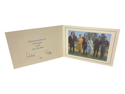 Lot 94 - H.M. Queen Elizabeth II and H.R.H. The Duke of Edinburgh , family signed 1976 Christmas card with gilt cyphers to cover and photograph of the Royal couple with their children to the interior, sign...