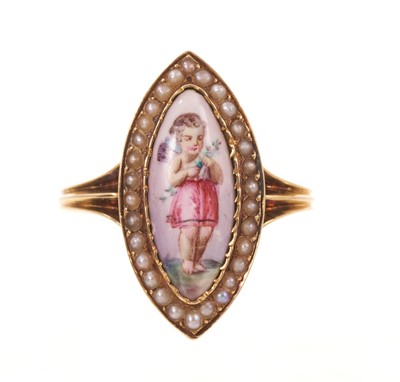 Lot 563 - Victorian enamel and seed pearl ring, the navette shape enamel plaque depicting Cupid, with a seed pearl border, pierced gallery with trifurcated shoulders on reeded gold shank, ring size approx...