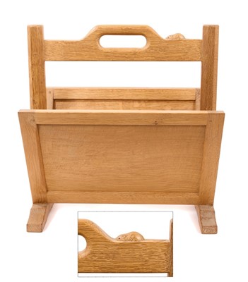 Lot 1431 - Robert Mouseman Thompson oak magazine rack, with signature mouse to the pierced top rail and splayed sides on sledge base, 43cm wide