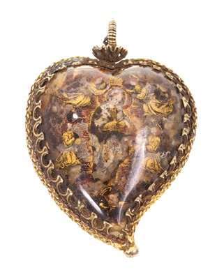 Lot 571 - A rare antique verre églomisé / crystal double-sided heart shape devotional pendant, probably 17th / 18th century, each side decorated with religious iconography, in a gilded white metal pendant mo...