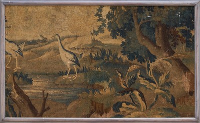Lot 1500 - 18th century verdure tapestry section, framed