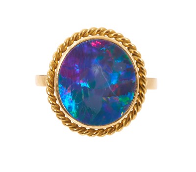 Lot 598 - Black opal ring in yellow metal setting, stamped 18ct, ring sizecN½-O.