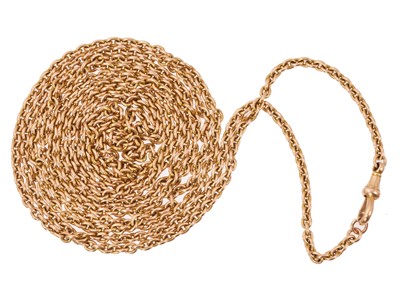 Lot 584 - Exceptionally long Edwardian gold chain with heavy gold cable links, applied '15' tag, and dog clip clasp. Approximately 183cm long.