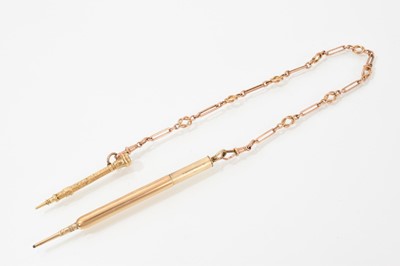 Lot 600 - Edwardian 9ct gold fancy-link fob chain with two Victorian yellow metal propelling pencils