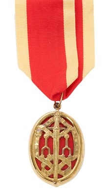 Lot 112 - Queen Elizabeth II Knight's Bachelor neck badge, silver gilt and red enamel (Garrard & Co. H.M. Birmingham 1983) with ribbon in fitted red leather case with gilt tooled front.