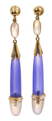 Lot 595 - Pair of Art Deco moonstone blue chalcedony and crystal pendant earrings, each with gold mounts and torpedo shaped drops, 57mm.