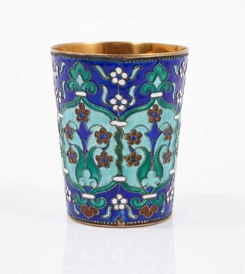 Lot 1013 - Late 19th / early 20th century Latvian gilt silver and enamelled vodka cup, with formal foliate ornament, 5.5cm high