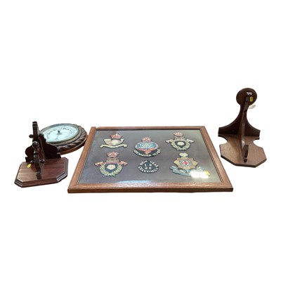 Lot 5154 - Barometer with ropetwist frame together with two clock brackets and a glazed display of military cloth badges