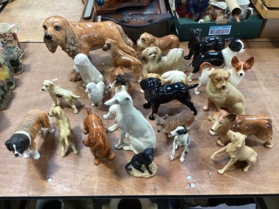 Lot 5131 - Group of ceramic dog figurines to include Beswick, Coopercraft etc