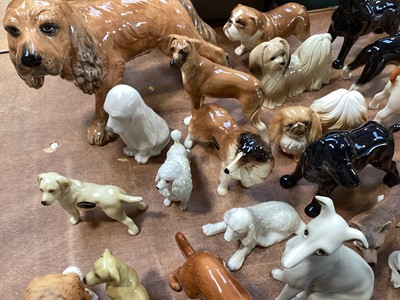 Lot 5131 - Group of ceramic dog figurines to include Beswick, Coopercraft etc