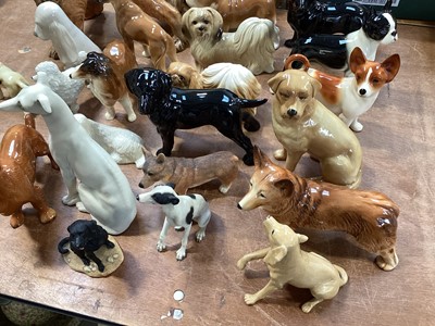 Lot 5131 - Group of ceramic dog figurines to include Beswick, Coopercraft etc