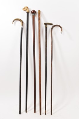 Lot 933 - Group of antique walking sticks, including an agate handled silver mounted stick, five others