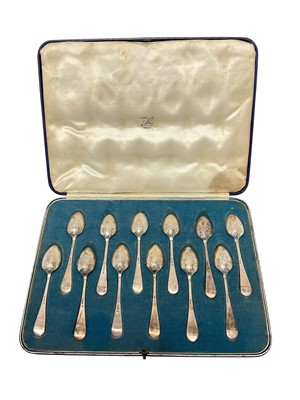 Lot 462 - Set of twelve George VI silver picture back teaspoons (Sheffield 1939), maker Thomas Bradbury & Sons Ltd, in a fitted case, all at 5.16ozs.