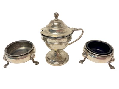 Lot 467 - Pair of Georgian silver salt cellars of cauldron form, raised on hoof feet, together with a Georgian silver mustard pot, (various dates and makers), all at 8.92ozs.