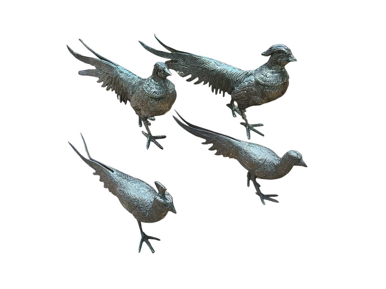 Lot 5064 - Four unusual silver plated pheasants