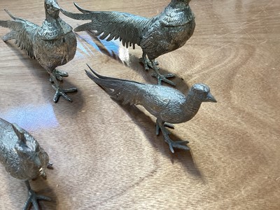Lot 5064 - Four unusual silver plated pheasants