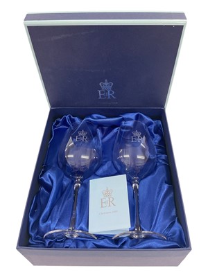 Lot 137 - H.M. Queen Elizabeth II, Royal Household Christmas gift 2012, pair large wine glasses with etched crowned ERII cyphers in fitted box with crowned ERII cypher to lid with card