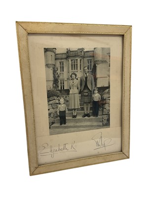 Lot 157 - H.M. Queen Elizabeth II and H.R.H. The Duke of Edinburgh, signed 1952 portrait photograph of the young Royal couple with their two young children at Balmoral signed in ink on mount ' Elizabeth R...