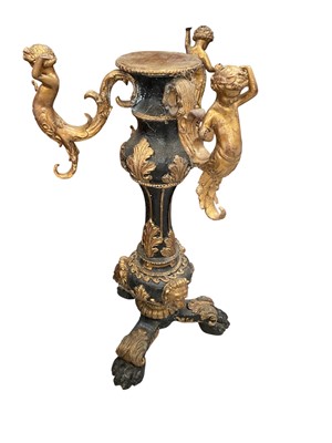 Lot 5377 - Pair of Italianate painted and gilt heavy cast metal pedestals, with figural supports and paw feet, 75cm high