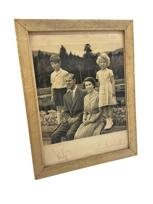 Lot 159 - H.M. Queen Elizabeth II and H.R.H. The Duke of Edinburgh, signed 1955 portrait photograph ..