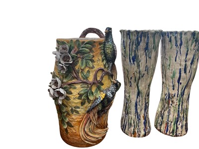 Lot 5248 - Large Cassetta Vietri barrel form vase, 53cm high, together with another large vase or stick stand with birds and flowers in relief, and a pair of large waisted vases