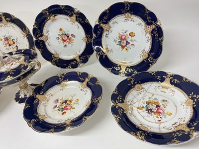 Lot 5059 - 19th century Staffordshire dessert service, painted with flowers on a cobalt blue and gilt ground, consisting of four plates, four comports, and a tureen and cover