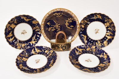 Lot 311 - Royal Worcester 'Japonisme' basket, with raised gilt decoration consisting of gilt snake, spider and butterflies in circular panels on a gilt patterned and cobalt blue ground, 13cm high, togethe...
