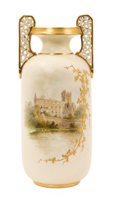 Lot 312 - Late Victorian Royal Worcester blush ivory twin handled cylindrical vase painted with a view of Worcester Cathedral, 18cm high