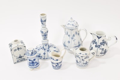Lot 315 - Group of German blue and white porcelain tea wares and other items, decorated with foliate patterns, most pieces with ribbed bodies, factories including Volkstadt, Furstenberg and Limbach