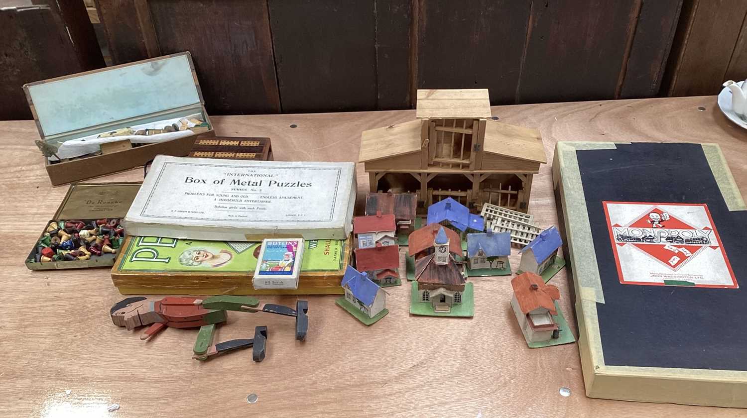Lot 5080 - Group of vintage toys to include wooden toy animals, Monopoly etc