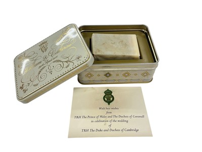 Lot 180 - The Wedding of H.R.H. Prince William of Wales to Catherine Middleton 29th April 2011, piece of wedding cake in original presentation tin with crowned WC cypher to lid and with card