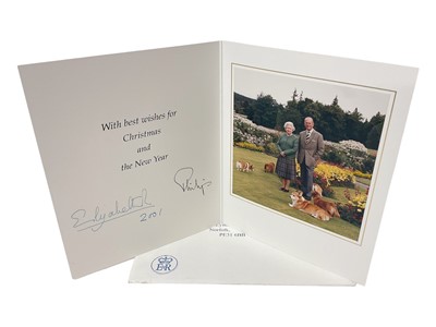 Lot 185 - H.M. Queen Elizabeth II and H.R.H. The Duke of Edinburgh, signed 2001 Christmas card with twin gilt ciphers to cover, colour photograph of the Royal couple with the corgis to the interior with en...