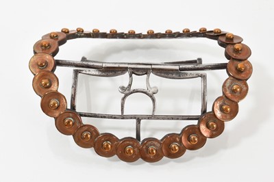 Lot 701 - Exceptionally large Georgian buckle, possibly for a Scottish plaid to be worn on the shoulder, with beaded copper discs and cut steel buckle, 10.5cm.