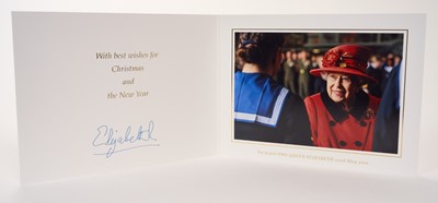 Lot 187 - H.M. Queen Elizabeth II, signed 2021Christmas card (the last official Christmas card sent by Her Late Majesty) with gilt cipher to cover and charming colour photograph of The Queen visiting H.M....