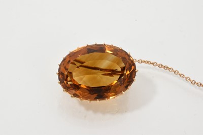 Lot 699 - Victorian gold mounted citrine brooch with an oval mixed-cut citrine measuring approximately 22.5mm x 16.5mm in gold claw setting