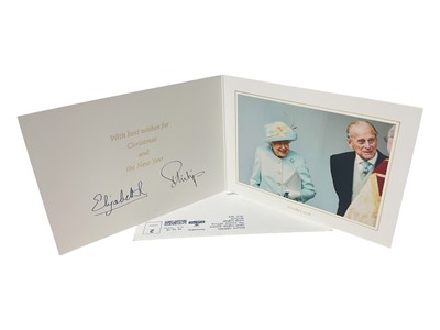 Lot 188 - H.M. Queen Elizabeth II and H.R.H. The Duke of Edinburgh, signed 2018 Christmas card with twin gilt ciphers to cover, colour photograph of the Royal couple to the interior with envelope