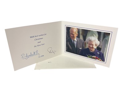 Lot 189 - H.M. Queen Elizabeth II and H.R.H. The Duke of Edinburgh, signed 2000 Christmas card with colour photograph of the happy Royal couple on a walk about, with envelope