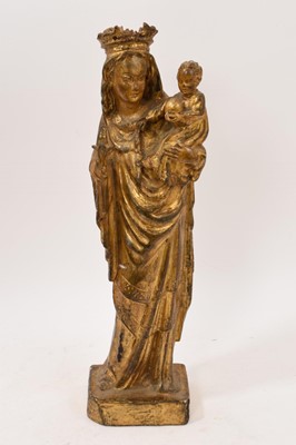 Lot 1033 - Antique carved and gilt gesso figure of Madonna and child