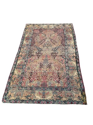 Lot 1504 - Kashan tree of life rug, in meandering animal border, 238 x 150cm