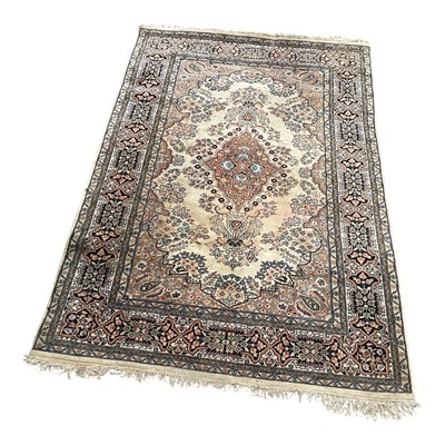 Lot 5351 - Cream ground rug