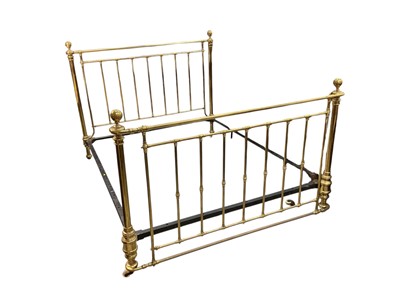 Lot 5391 - Extremely large Victorian brass bed, having bar ends raised on castors, approximately 193cm wide x 242cm long. Inner measurements approximately 222cm x 183cm