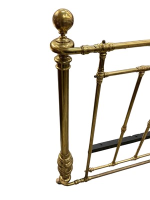 Lot 5391 - Extremely large Victorian brass bed, having bar ends raised on castors, approximately 193cm wide x 242cm long. Inner measurements approximately 222cm x 183cm
