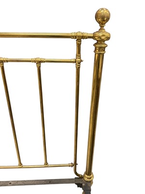 Lot 5391 - Extremely large Victorian brass bed, having bar ends raised on castors, approximately 193cm wide x 242cm long. Inner measurements approximately 222cm x 183cm