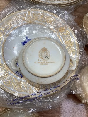 Lot 5097 - Royal Worcester gilt Hyde Park pattern part dinner service, comprising two tureens, gravy boat, soup cups, plates of various size