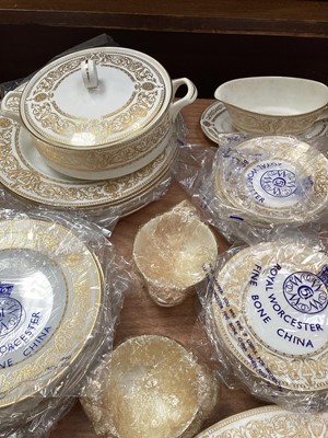 Lot 5097 - Royal Worcester gilt Hyde Park pattern part dinner service, comprising two tureens, gravy boat, soup cups, plates of various size